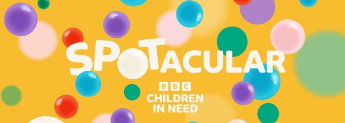 Children in Need 'Spotacular' Logo. Colourful bubbles on a bright yellow background with 'Spotacular' in white text.